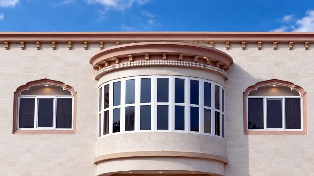 Corporate headquarters in Karachi with stone facade and uPVC windows